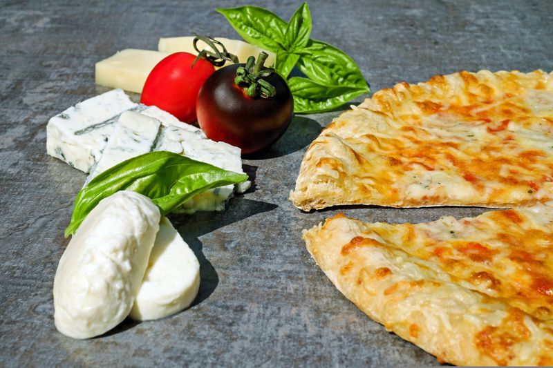 Four Cheese marco pizza with a golden crust